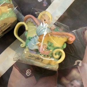 Precious Moments tea pots
